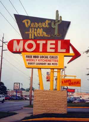 Desert Hills Motel sign by day